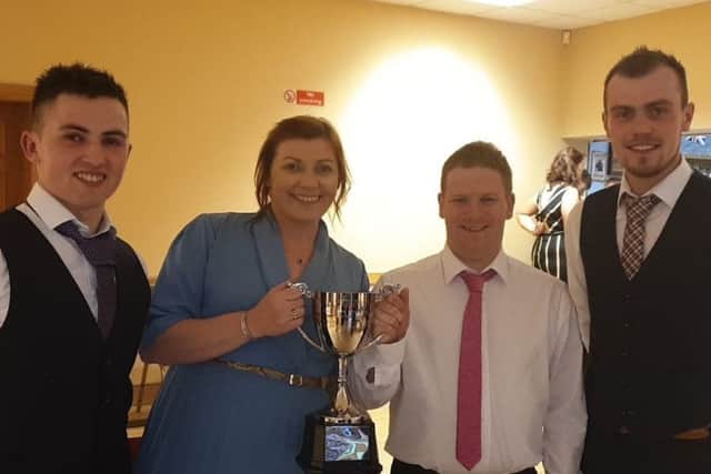 Ian Walker, Joanne Shilliday, Geoffrey Crozier and Matthew Livingstone pictured with the YFCU Club of the Year cup
