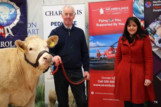 The heifer with Will Short and Michelle McDaid, Air Ambulance