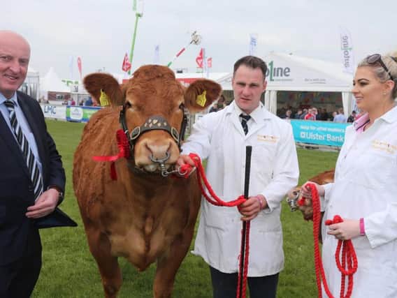 Stephen Crawford and Julie-Ann Cairns with Martin Convery, Ulster Bank, at the Balmoral Show
