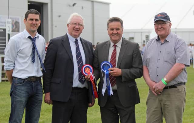 Announcing details of the Simmental Club's inaugural NI National Show at Omagh on July 6 are, from left: club chairman Conrad Fegan, with Cecil McIlwaine, Tyrone Farming Society; club secretary Robin Boyd, and committee member David Hazelton. Picture: Julie Hazelton