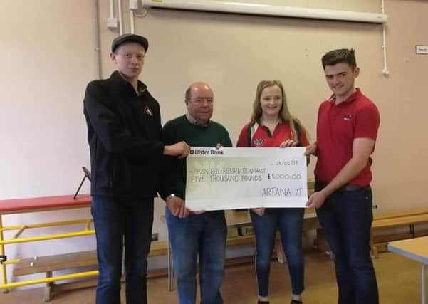 Artana YFC presenting their donation to Colin Bell from the Kevin Bell Repatriation Trust