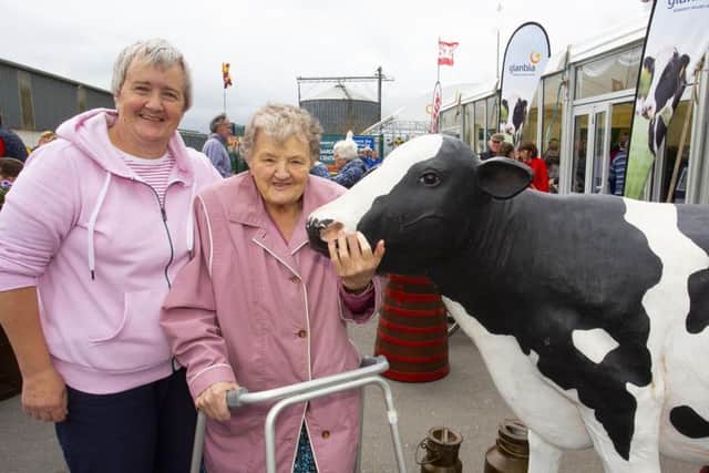 31/5/2019
Glanbia Shelburne Co-Op Campile Co Wexford celebrating 100years.
From left; Ann Caulfield and Bridget Furlong from Campile, Co Wexford. Photo;Mary Browne
Press release
Campile marks centenary celebration

31 May 2019
An action-packed celebration got underway to mark an eventful 100 years of the Shelburne Co-operative Society which was set up by farmers in the heart of Campile, Co Wexford to serve their community.
Over the century it has overcome a WWII bombing with the tragic loss of life of staff, the economic uncertainty of wartime and a massive fire at the start of the harvest season in the 50s that nearly spelled disaster.
Along with the changing face of the Irish agriculture scene, it moved from once trading in rabbits and poultry to a modern day enterprise with a strong turnover through the innovative actions of its staff and farmers.
Siobhán Talbot, Glanbia Group managing director, paid tribute to the work of the current staff and those that had gone before as the vision of the founding farm