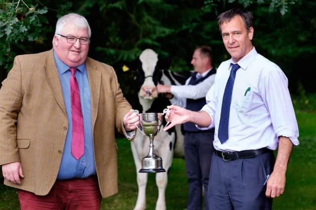 Ulster Bank has a long association with Holstein NI's annual herds inspection competition. Club chairman Charlie Weir, and Ulster Bank's Cormac McKervey are delighted to announce that the winner of the permier herd section will receive £1,000. Photographs: Columba O'Hare/ Newry.ie