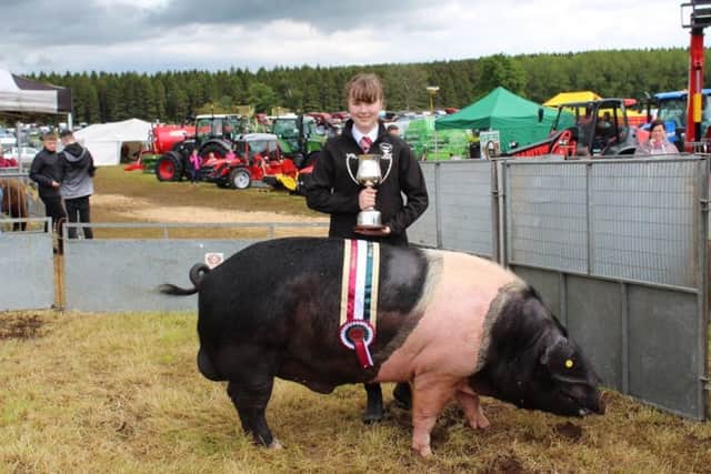 Samara Radcliffe, from Banbridge, with the Pig Inter-Breed 
Champion at Armagh Show 2019