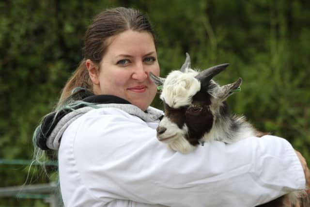 Clara Conn, Lisburn, with her Pygmy goat Cornbrook Ash at Saintfield Show. Picture: Julie Hazelton