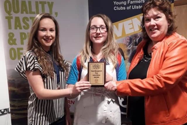 Winner of the senior category in the YFCU home management final 2019 Hannah Cromie, Rathfriland YFC, with YFCU president Zita McNaugher and chef Paula McIntyre