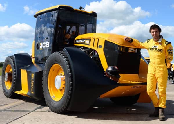 Guy Martin pictured moments after setting a new British speed record for the fastest tractor with the JCB Fastrac