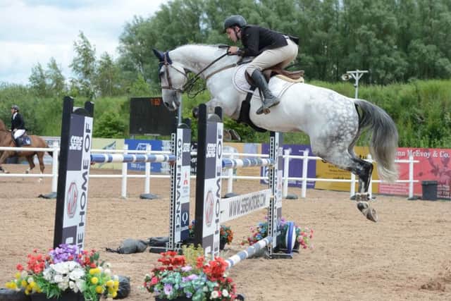 Shane McCloskey riding Coolethill Bonzo C, second in the 1.35m UR Ballyward Summer Tour Grand Prix