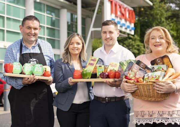 Tess O'Neill, commercial manager at Tesco Northern Ireland (2nd left) joins Malcolm Feaney from Big Pot Company,  Conor Daykin from Clean & Tasty, and Lorna Robinson from Cloughbane. The three producers have become the latest local brands to catch the eye of buyers at Tesco Northern Ireland, as it continues to seek out the best of local produce for customers