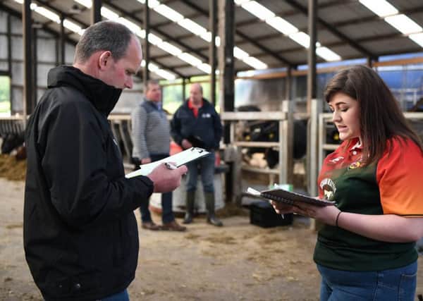 Jeannie McCaffrey from Cappagh YFC taking part in the dairy stock judging competition.