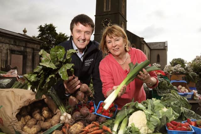 Alderman Deborah Girvan (CRCP) and Jim Burke (Director of Sales at Hagan Homes) celebrate the exciting new partnership between Comber Farmers Market and Hagan Homes Ltd