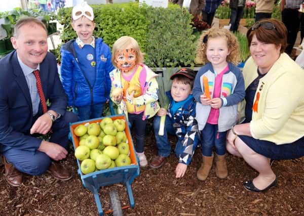 UFU and RUAS representatives welcome our local N Ireland horticulture video stars into the Healthy Horticulture Marquee at RUAS 2019.  The Children profiled with Stewart Moore Ulster Rugby Academy in a video promoting local vegetables and the importance of a healthy balanced diet.   Left to right: UFU Deputy President David Brown, horticulture stars Alfie and Harriet Reid, William and Charlotte Brown with Denise Kelso Chairman Balmoral Show Horticulture Committee