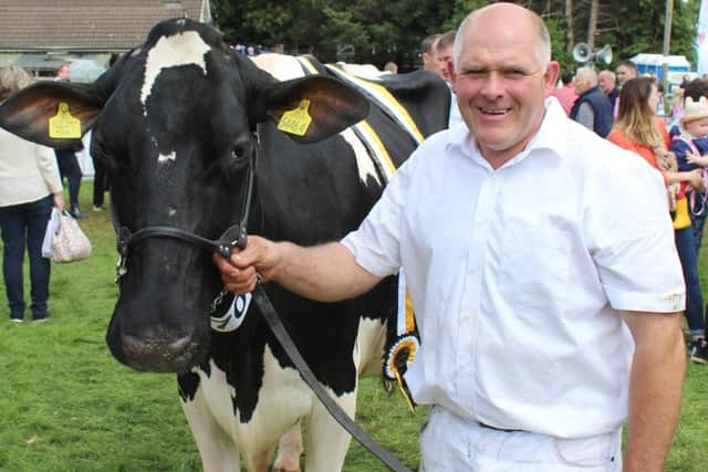 Iain McLean, from Bushmills with the dairy inter-breed champion at Clogher Valley Show 2019