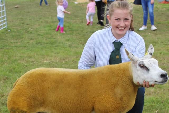 Sophie McAllister, from Ballymena with the sheep inter-breed champion at Clogher Valley Show 2019. The Beltex ewe is owned by her aunt Elizabeth McAllister