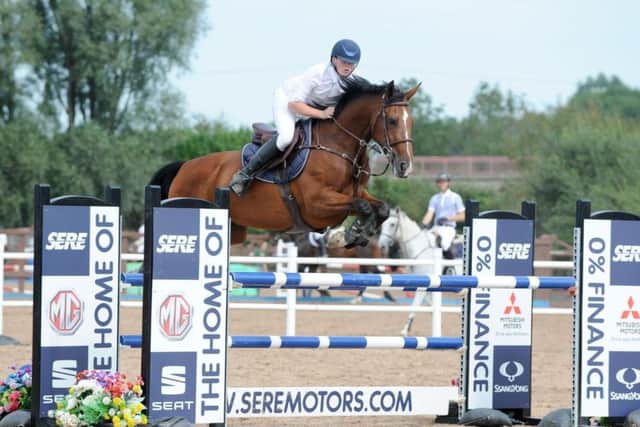 Dylan Ward riding Hard Times (AES), winners of the 1.20m