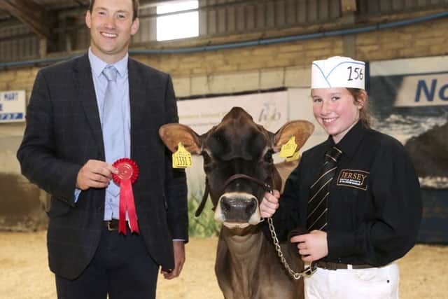 Alissa Marrs exhibited the first prize winning Potterswalls Chrome Bell, owned by Martin King, Ballymena. Presenting the prize is judge Iwan Thomas. Picture: Jane Steel
