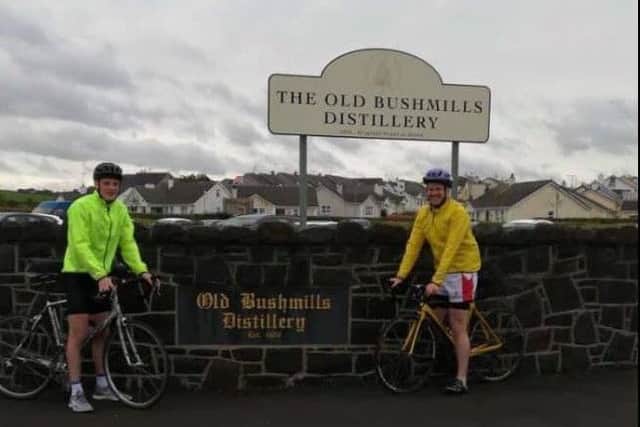 James Fullerton and Peter McWhirter during their last 100 miles taking pitstop outside Bushmills Distillery