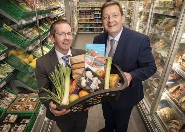 Pictured at Co-op's Beersbridge Road store in Belfast is Michael Bell, Executive Director of NIFDA and Ciaran Rafferty, Corporate Banking Manager, Danske Bank