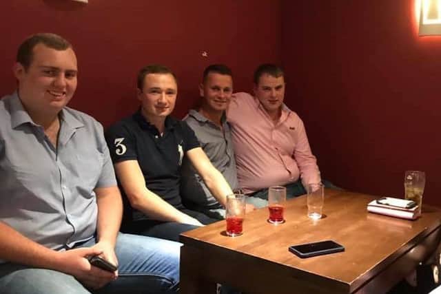 Club members James Killen, Thomas Rankin, Cameron Nutt, Gordon Killen, Danielle Hawthorne and Gordon Crockett waiting for the waxing to commence