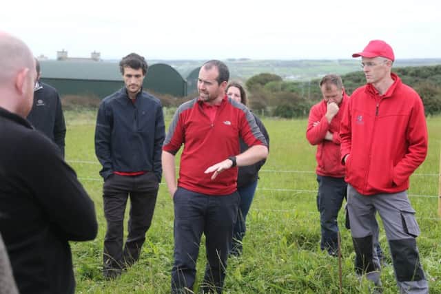 Kevin Duncan, Farmer Advisor NI, National Trust and Dr Cliff Henry, Area Ranger, National Trust explain out the field the process of the North Coast Farm Resilience Project, a pioneering land management project for the National Trust in Northern Ireland