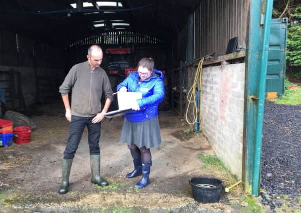 Dermot McAleese, BDG member and Northern Ireland Sheep Programme participant discussing water management options with CAFRE agri-environment adviser Mary Ann Alexander.