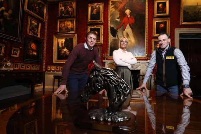 Pictured with the Ladbrokes trophy are Emma Meehan, Chief Executive of Down Royal Racecourse (centre) and jockeys Keith Donoghue (left) and Sean Flanagan (right)