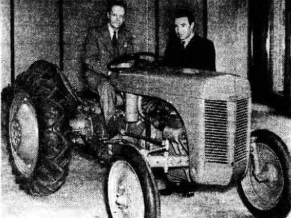 Mr Harry Ferguson at the wheel of the first demonstration model of his new tractor to arrive in Northerrn Ireland. With Mr Ferguson is Mr H C Reid, director and general manager of Messrs Harry Ferguson (Motors) Ltd in October 1946