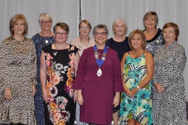 The committee of Maghaberry WI - Shirley Dew, Sally Chapman, Sharon Coulter, Heather Cairns, President Julie Uprichard, Jean Skuce, Dawn Robinson, Vice President Ann Henning, Heather Campbell.