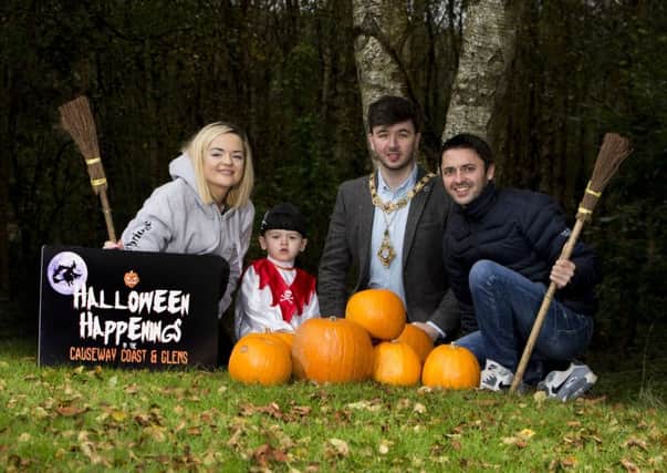 The Mayor of Causeway Coast and Glens Borough Council Councillor Sean Bateson pictured with Ruth Owen and Gareth Witherow, representing sponsors The Newbridge/The Tides, and little Jackson Witherow as the countdown begins to this years Halloween Happenings in the Causeway Coast and Glens.