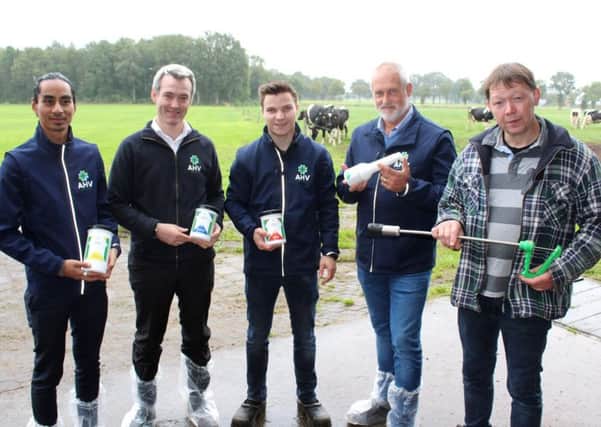 Discussing the impact of the AHV product range on the Holten (East
Holland) farm of Wim Lubbersen and his son Kevin l to r: Arun van Luveren, AHV; Adam Robinson, AHV UK & Ireland; Kevin Lubbersen;  Gertjan Streefland, AHV and Wim Lubbersen
