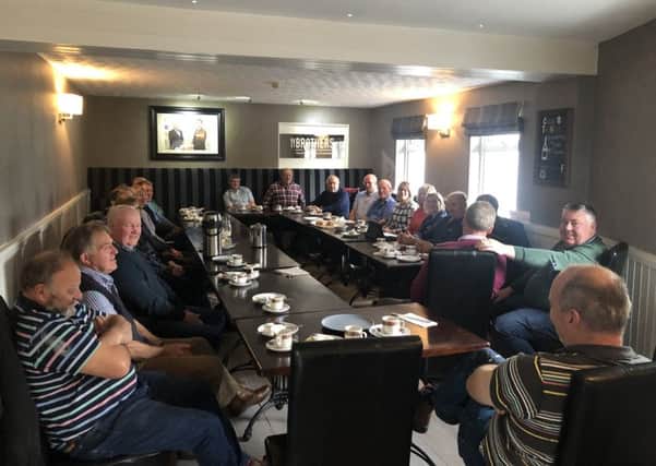Members of the Ballyclare group enjoying breakfast, sponsored by the Bank of Ireland, at the Five corners Pub with presenter was Mary-jane Robinson from Thompson feeds