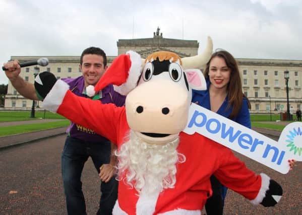 Left to right are, Andrew Patton, YFCU vice president, Moo The YFCU mascot and Amy Bennington, commercial marketing manager, Power NI
