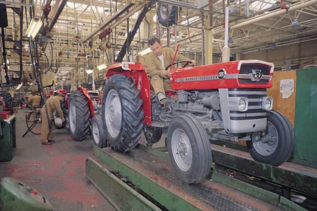 The Banner Lane factory in Coventry in 1965  an MF 135 tractor comes off the production line