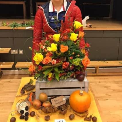Lynsay Hawkes, of Seskinore YFC,  pictured at the recent floral art competition heats at Fivemiletown College