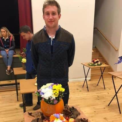Trent Brown, of Seskinore YFC,  pictured at the recent floral art competition heats at Fivemiletown College