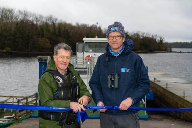 Brad Robson and former RSPB Fermanagh warden Joe Magee launch the conservation charitys new boat on Lower Lough Erne. The cot named the Joe Magee will be used to transport livestock on and off islands, with the animals grazing resulting in an ideal habitat for breeding wading birds including the endangered curlew. Funding for the cot came from the European Unions INTERREG VA Programme through the RSPB NI-led Co-operation Across Borders for Biodiversity (CABB) project.  Pictures: Ronan McGrade