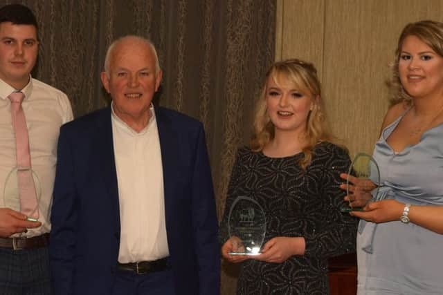 Senior YLB Team members Phillip Williamson, Amy Griffith and Louise Clarke with Club President Jim Quail