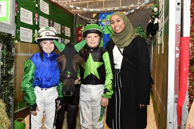 Kadijah Mellah, the first British Muslim woman to ride in a horse race (which she won!) and the first jockey to compete wearing a hijab, visits the ponies and jockeys taking part in The Saracen Horse Feeds Shetland Pony Grand National