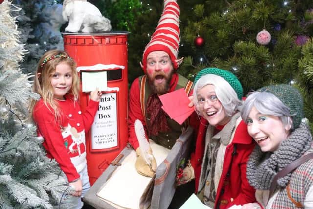 Caitlin Harten from Seacon, Ballymoney, posts her letter to Santa at the Nort Coast Post Office. Picture: Kevin McAuley/McAuley Multimedia
