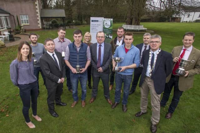 Winners, officials and sponsors in this years UGS Grassland Farmer of the Year competition pictured with their awards at the Societys Conference in Templepatrick