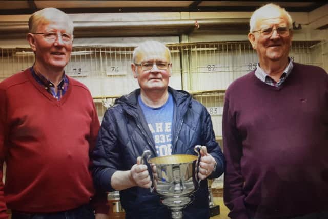Highest Prize-winner Paddy McManus with Chairman Tom Young and William Livingstone Press Officer.