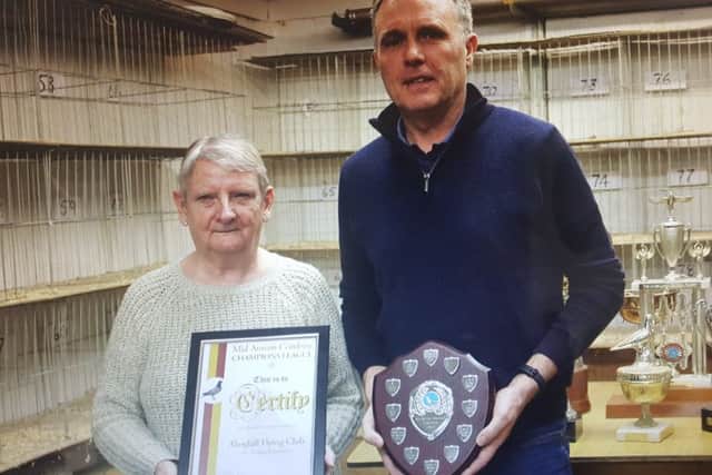 Rosie presents the MAC Champions League awards to Laurence Robinson.