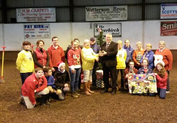 Presentation to Gwen Garrett of Omagh RDA Group by Councillor Paul Robinson, Vice Chair of Fermanagh and Omagh District Council.