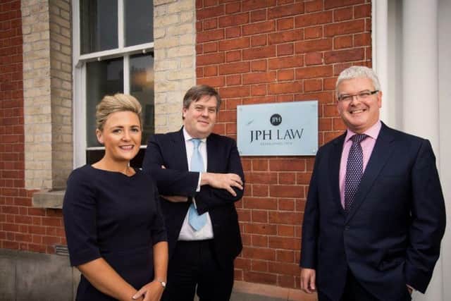 Kate Ervine, Director JPH Law, pictured with Kevin Neary, Director at Donnelly, Neary & Donnelly, and Michael Campbell, Director at  Grant & Campbell