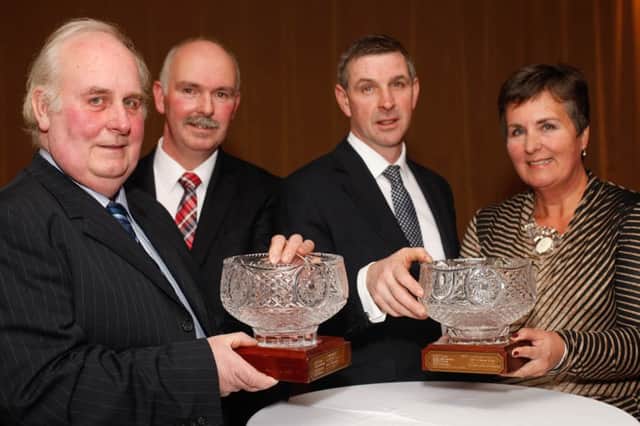 Richard and Jill  Hunniford, Portadown, were the winners in the Co Armagh UFU Oat and Wheat Competitions. They are pictured getting their awards at the County Armagh Ulster Farmers' Union annual dinner in Newry from Billy Morton, chairman, Co Armagh, UFU and Ian Marshall, right, UFU president