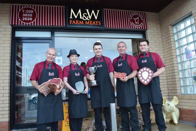 M and W Meats staff with some of the prizewinning beef outside the shop at Scotch Street, Portadown.