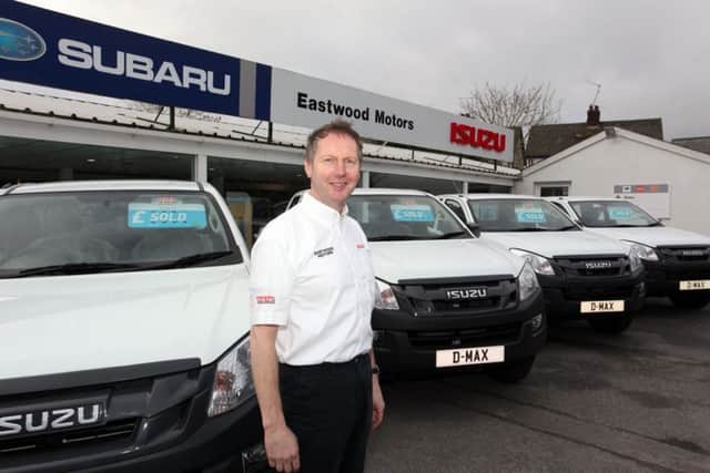 Local dealers with the first of 2016 Fleet deliveries to NI Utilities - John Barr Cars, Crumlin and Des Eastwood, Lisburn.