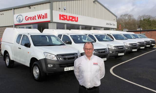 Local dealers with the first of 2016 Fleet deliveries to NI Utilities - John Barr Cars, Crumlin and Des Eastwood, Lisburn.
