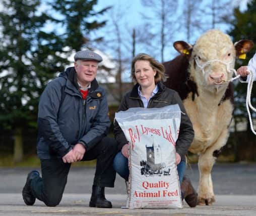 Sale sponsor Jane Bond from R & J Lyness with Elite breeder Mervyn Richmond look forward to the Hereford bull sale in Dungannon February 22.