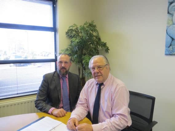 Chris Osborne, Senior Dairy Policy Officer and DR Mike Johnston, Director of Dairy UK NI at a recent meeting to discuss the current difficulties in the dairy sector.